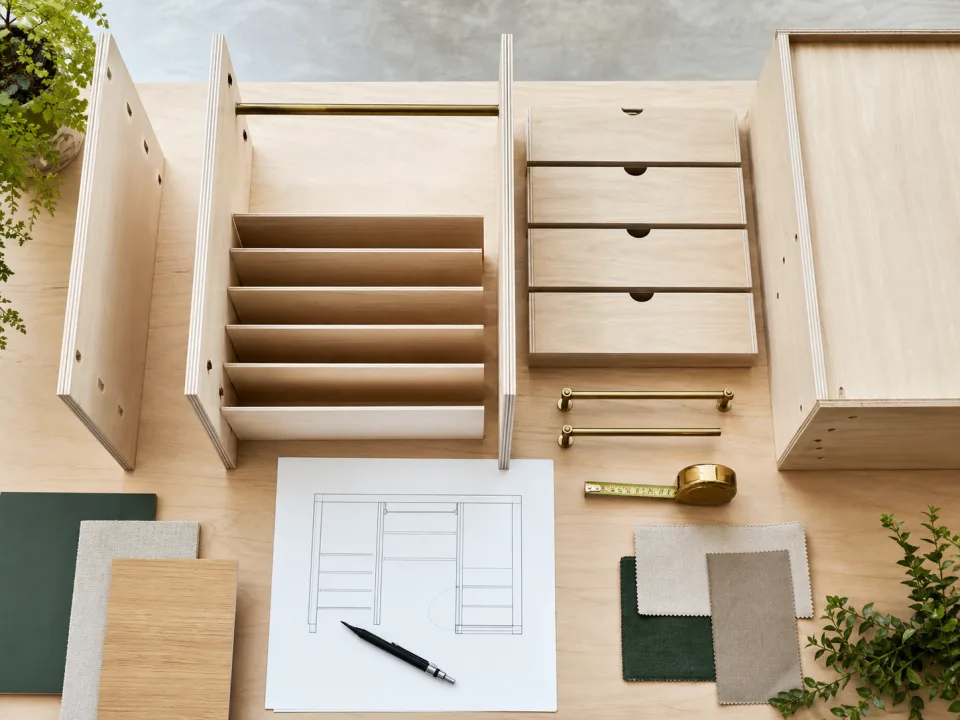 Closet shelving and cabinet components laid out for project planning for Project Material Delivery Planning Guide